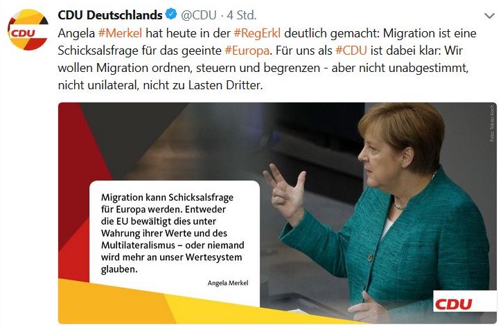 Angela Merkel im grünen Blazer im Deutschen Bundestag: Migration kann Schicksalsfrage für Europa werden".